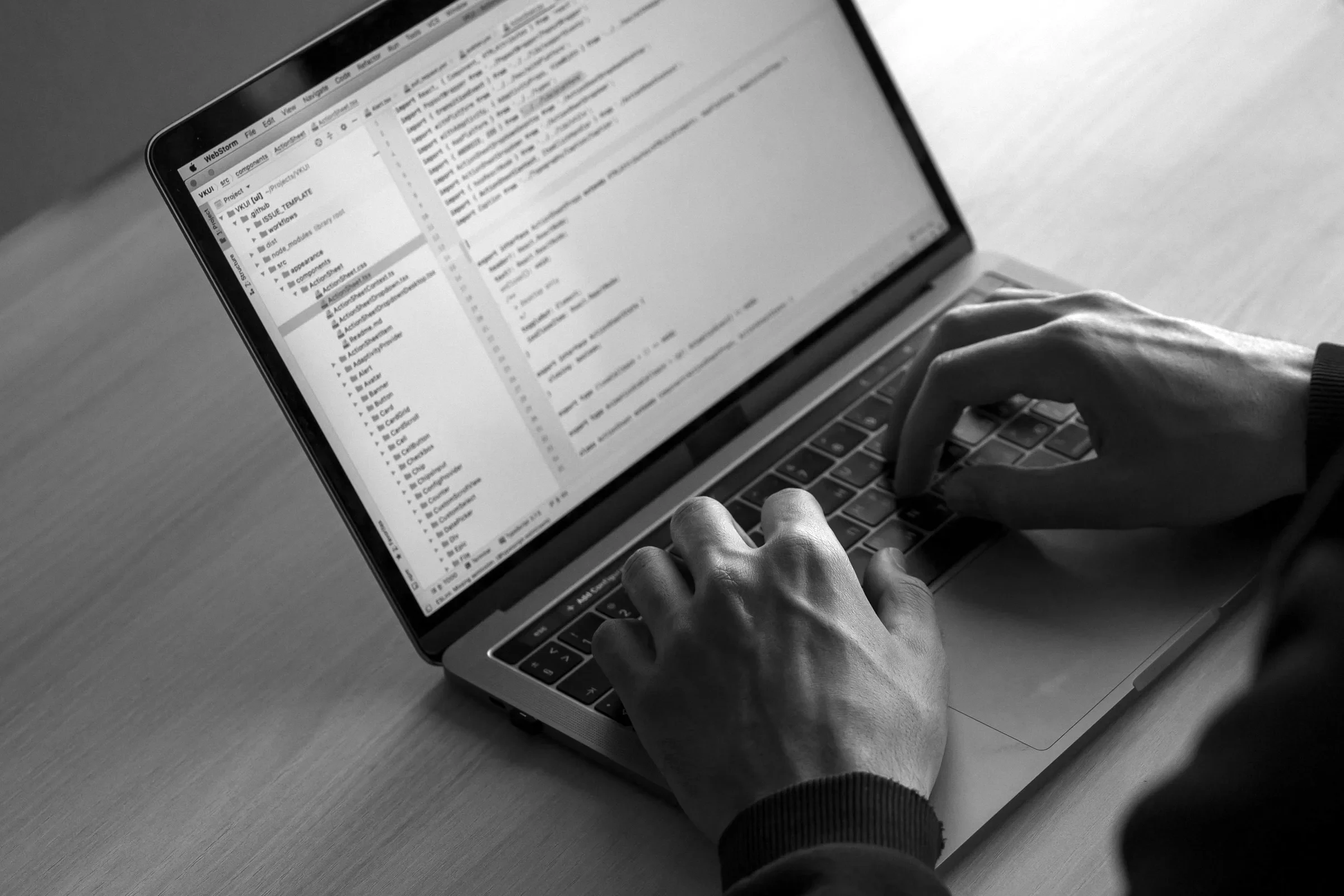 A developer writing code late in the evening