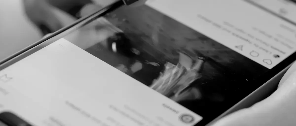 Scrolling a social feed on a phone
