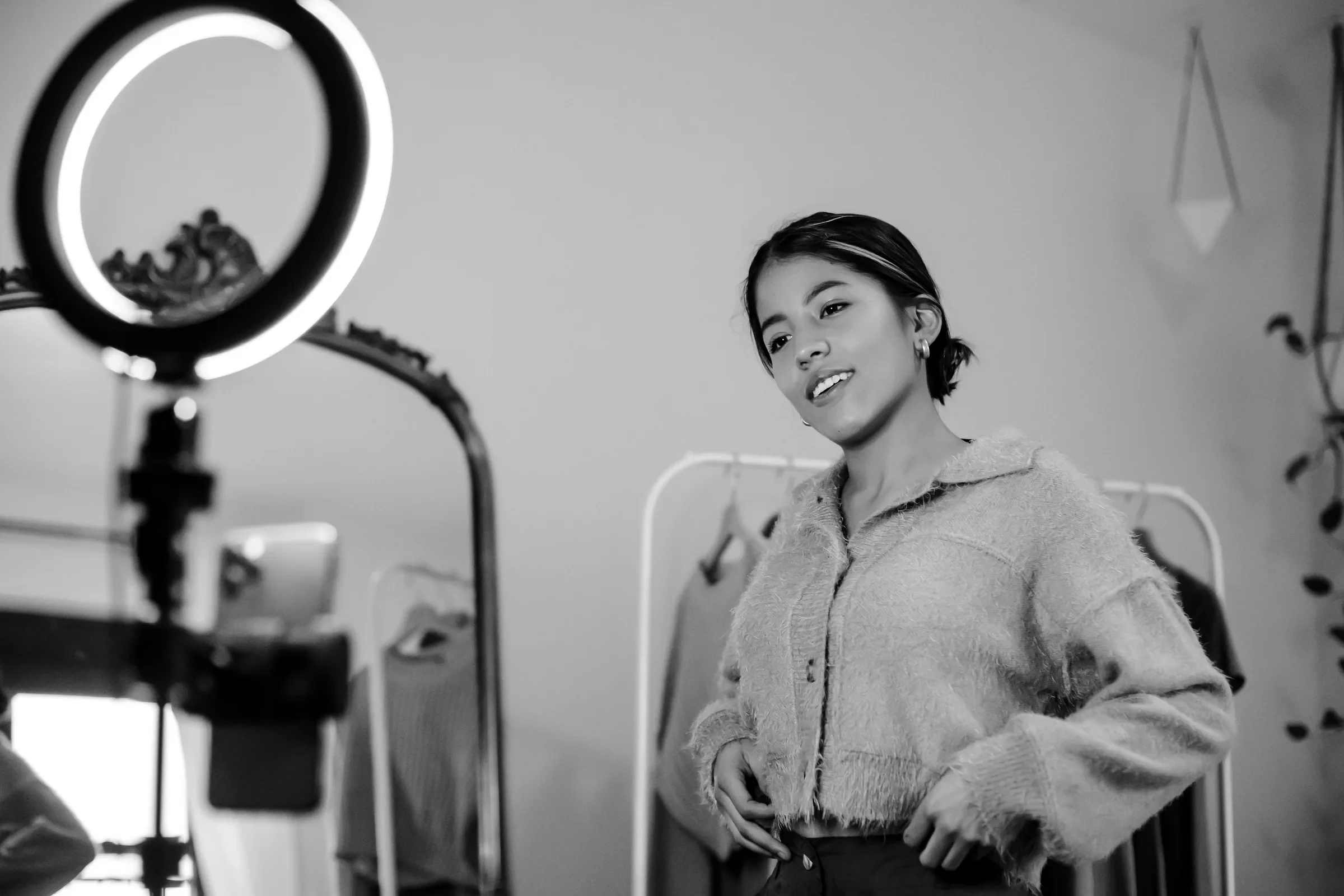 A creator filming short-form video with a ring light