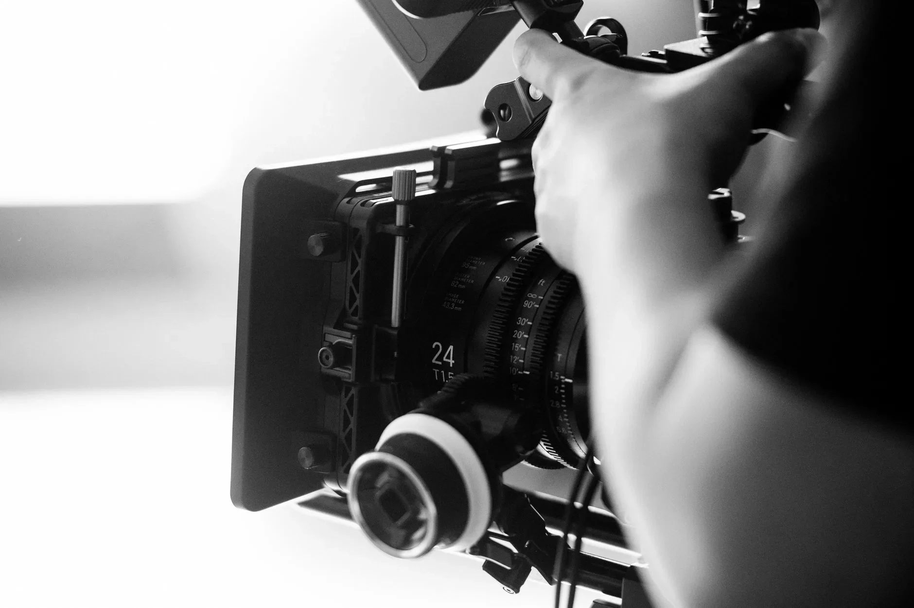 A cinema camera being adjusted on set
