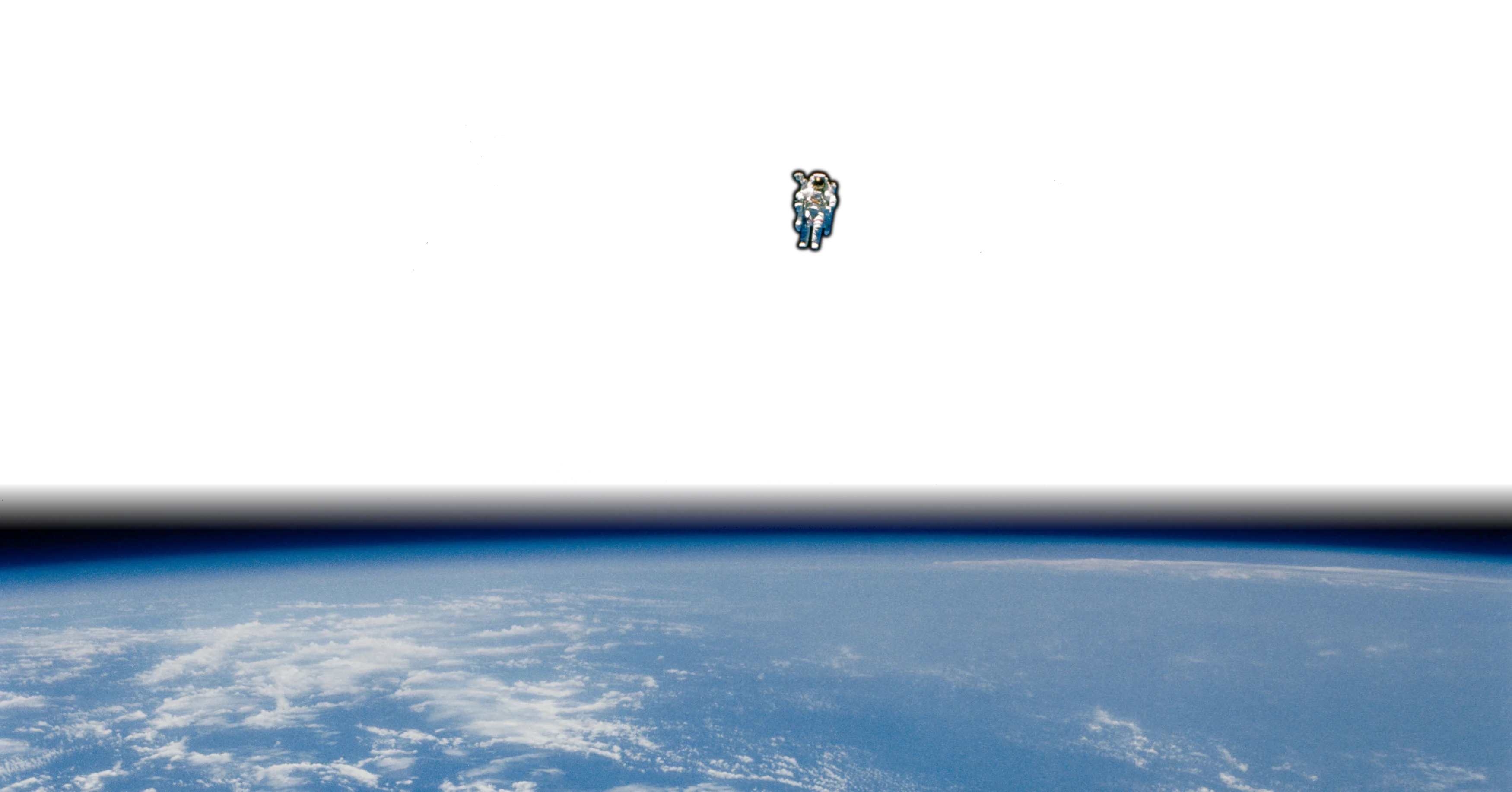 Astronaut in untethered free flight above Earth