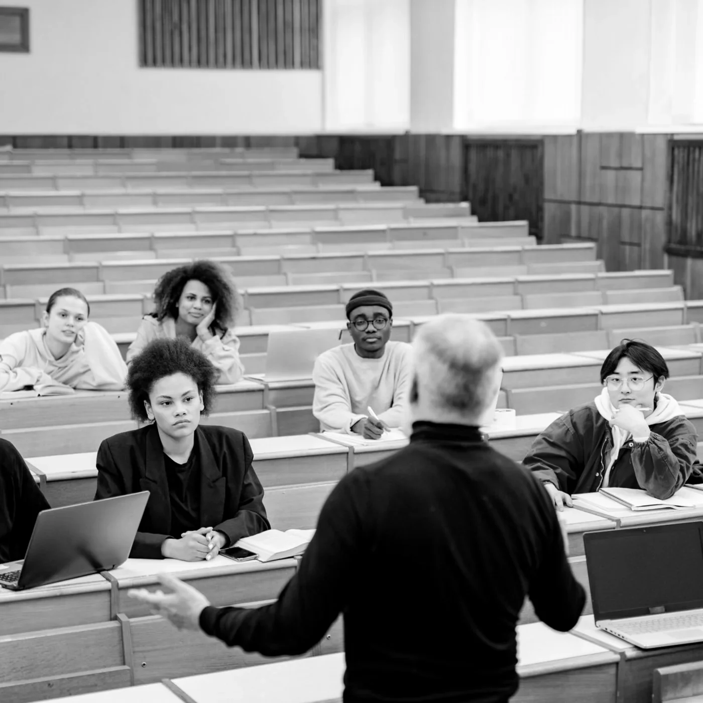 Students seated in a university lecture theatre