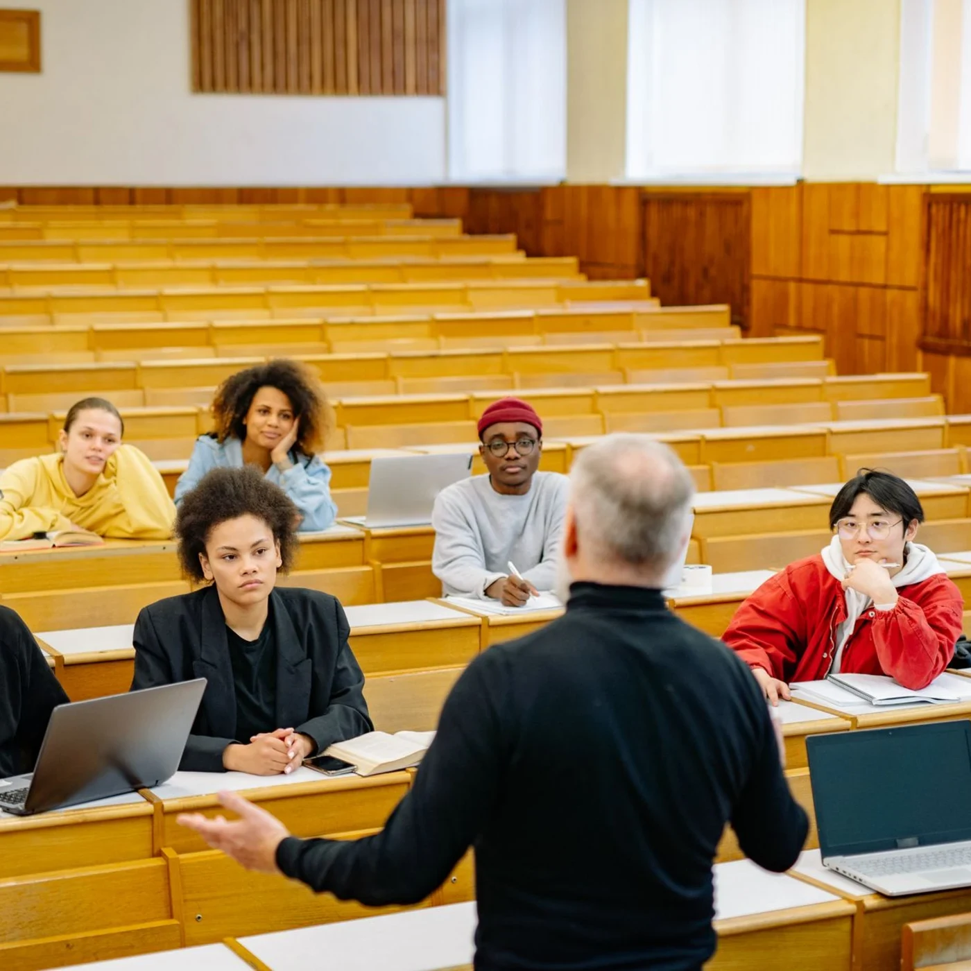 Students seated in a university lecture theatre