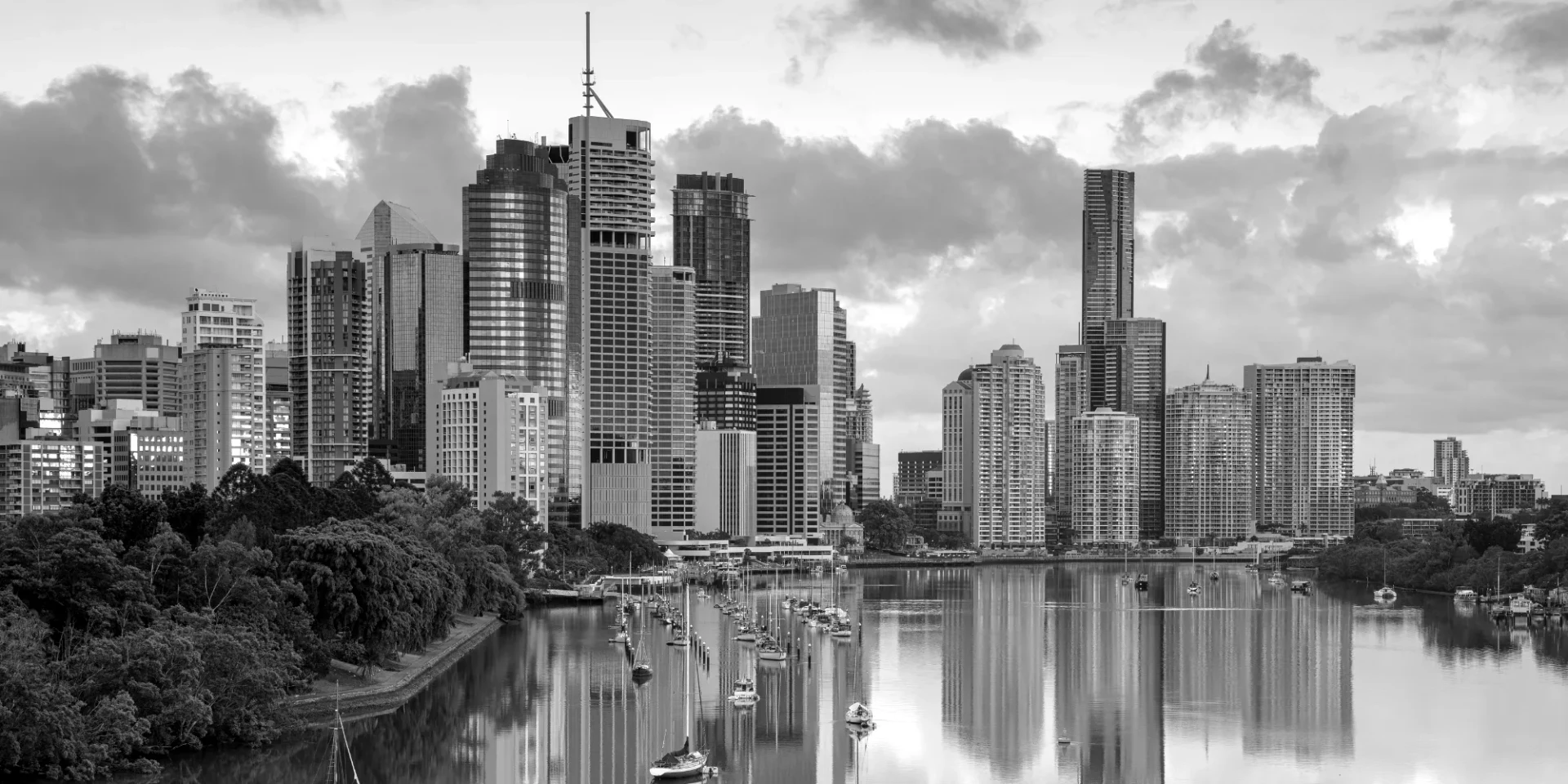 The Brisbane skyline and river at dusk